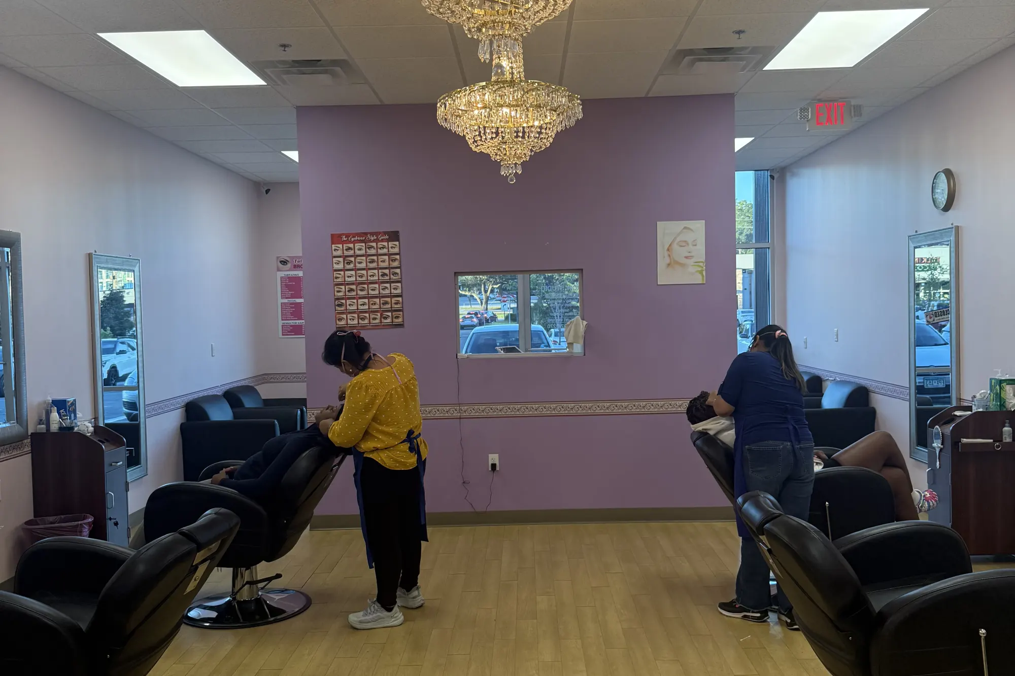 Sunlit salon chairs inside Tally Brow Studio near FSU on W Tennessee Street